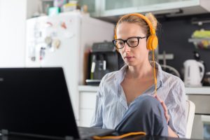 mid adult business woman working laptop home